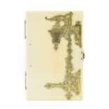 A Gilt Metal Mounted Ivory Aide de Memoire, circa 1870, of rectangular form, applied with scroll and