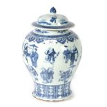 A Chinese Porcelain Baluster Jar and Cover, Kangxi reign mark and possibly of the period, painted in