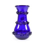 A ''Bristol'' Blue Glass Baluster Vase, early 19th century, of fluted form with folded rim and three