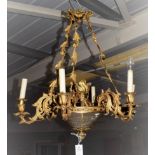 A Gilt Metal Six-Light Chandelier, 19th century, with leaf cast boss and chains, cut glass bowl