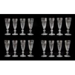 A Set of Eighteen Baccarat Champagne Glasses, modern, Harcourt pattern, with panelled conical bowls,
