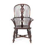 A Mid 19th Century Yewwood and Elm Seated High-Back Windsor Armchair, with double spindle back