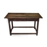 An Early 18th Century Joined Oak Refectory Style Table, the three plank top with cleated ends and