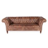 A Victorian Style Buttoned Brown Leather Chesterfield Sofa, modern, with rounded arms and