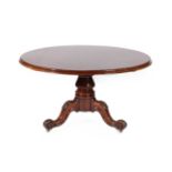 A Victorian Circular Mahogany Breakfast Table, Circa 1870, the moulded top pivoting on a platform