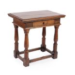 A Walnut Side Table, the rectangular top above a nulled border and single frieze drawer, on gun