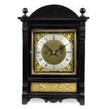 A German Quarter Striking Mantel Clock, circa 1890, arched case, gilt metal floral decorated front