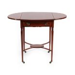 An Edwardian Mahogany, Satinwood Banded and Ebony Strung Dropleaf Table of oval form above a