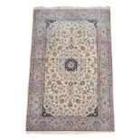 Nain Part Silk Carpet Central Iran, circa 1970 the cream field of curvilinear vines around a