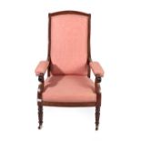 ~ A Victorian Mahogany Upholstered Open Armchair, late 19th century, recovered in pink fabric,