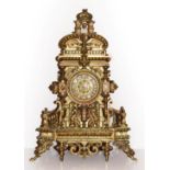 An Elaborate Gilt Metal Striking Mantel Clock, circa 1890, the imposing case with a gallery pediment