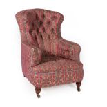 A Victorian Horsehair Armchair, circa 1880, recovered in buttoned floral fabric, with overstuffed