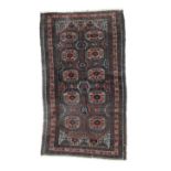 Baluch Rug North East Iran, circa 1900 The chocolate brown field with two columns of Salor güls