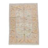 Ushak Design Rug Central Anatolia, modern the ivory field of angular vines and plants enclosed by