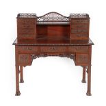 A Chippendale Revival Carved Mahogany Desk, late 19th/early 20th century, the upper section with a