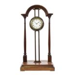A Late Victorian Mahogany Gravity Rack Mantel Timepiece, circa 1900, arched pediment with supporting