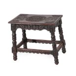 A Victorian Scottish Carved Oak Stool, late 19th century, the top carved with eagles and a central