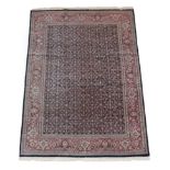 Indian ''Feraghan'' Carpet, modern The indigo Herati field enclosed by terracotta orders of