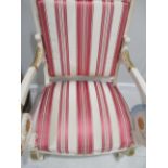 ~ A Pair of Late 19th Century Parcel Gilt Armchairs, recovered in striped silk, the scrolled and