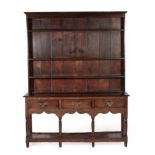 A Late George III Open Dresser and Rack, early 19th century, the upper section with three fixed