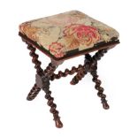 A Victorian Rosewood Dressing Stool, mid 19th century, with floral needlework seat, on a spiral