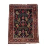 Fine Bidjar Rug Iranian Kurdistan, circa 1900 The indigo lattice field with rampant lions around a