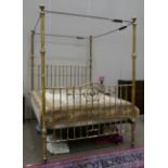 A Victorian Super Kingsize Brass Four-Poster Bed, circa 1880, the tubular frame with ball surmounted