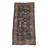 Kazak/Gendje Rug South Caucasus, circa 1860 The field of polychrome hooked güls on an indigo