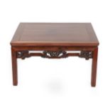 A Chinese Hardwood Coffee Table, circa 1900, of square form with pierced and humpback stretcher,