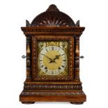 A German Mahogany Quarter Striking Table Clock, circa 1890, arched pediment, sound fret side