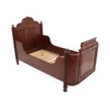 A Mid 19th Century Flame Mahogany Single Bedstead, with panelled headboard and footboard all between