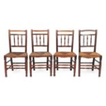 A Set of Four Mid 19th Century Ash and Rush-Seated Spindle-Back Armchairs, with chamfered top