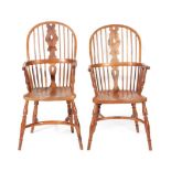 A Matched Pair of 19th Century Yew Windsor Armchairs, with double row spindle back supports and