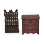 A Victorian Stained Pine Miniature Chest, of nailed construction, with two short over two long