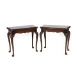 A Pair of Early 20th Century Walnut Card Tables, in George I style, of serpentine shaped form with