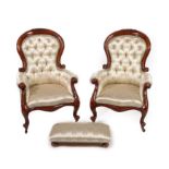 ~ A Pair of Victorian Style Hardwood Armchairs, covered in buttoned silk, with moulded and carved
