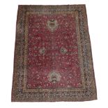 Unusual Sivas Carpet Central Anatolia, circa 1910 The raspberry field of floral vines around two