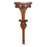 A Victorian Mahogany Floor-Standing Clock Bracket, scroll and floral carved floor-standing support