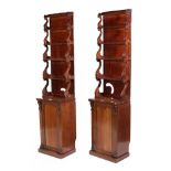 A Pair of George IV Carved Mahogany Bookcases, in the manner of Gillows, 2nd quarter 19th century,