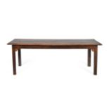 A George III Joined Oak Dining Table, late 18th/early 19th century, of three plank construction with