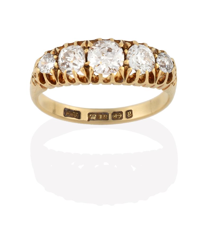 An 18 Carat Gold Diamond Five Stone Ring, the graduated old cut diamonds in yellow claw settings, to