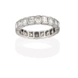 A Diamond Eternity Ring, the continuous band formed of round brilliant cut diamonds alternating with