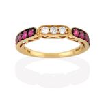 A Ruby and Diamond Half Hoop Ring, by LeVian, three round brilliant cut diamonds flanked by four