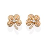 A Pair of Diamond Earrings, realistically modelled as floral motifs, set throughout with round
