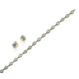 An Opal Bracelet, the sixteen chain linked oval cabochon opals in yellow rubbed over settings,