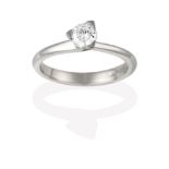 A Platinum Diamond Solitaire Ring, the round brilliant cut diamond in a claw setting, to