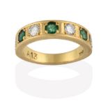 An Emerald and Diamond Half Hoop Ring, four round brilliant cut diamonds alternate with three