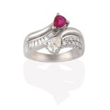 A Ruby and Diamond Ring, the parted shoulders set throughout with baguette cut and round brilliant