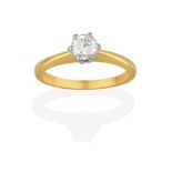 An 18 Carat Gold Diamond Solitaire Ring, the round brilliant cut diamond in a white claw setting, to