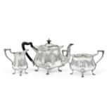 A Three-Piece Edward VII Silver Tea-Service, by Sheffield, 1904, by Hawksworth, Eyre and Co. Ltd.,